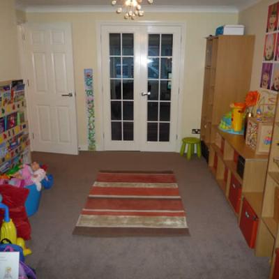Room Turned Into Shelved Play Room Fully Decorated